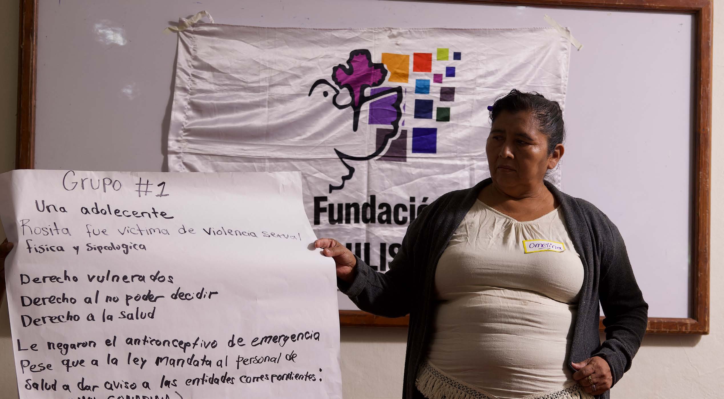 An Acceso workshop participant presenting a community rights exercise